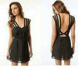 Double in brass black dress